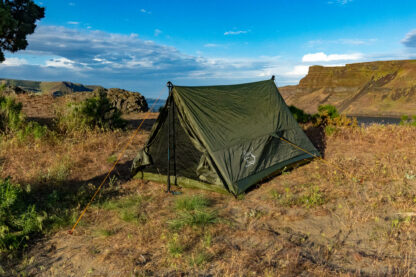 River country products trekker 2 trekking pole tent backpacking tent set up next to river