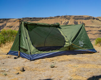 River Country Products Trekker 1A trekking pole tent backpacking tent set up next to river