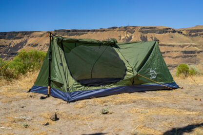 River Country Products Trekker 1A trekking pole tent backpacking tent set up next to river