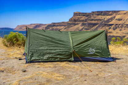 River Country Products Trekker 1A trekking pole tent backpacking tent set up next to river