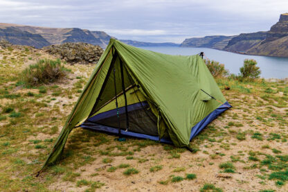 backpacking trekking pole tent next to river