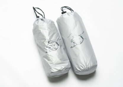 silver pillow and pad in bags