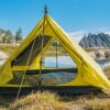 backpacking trekking pole tent outer shell set up near water