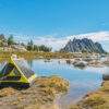 backpacking trekking pole tent outer shell set up near water