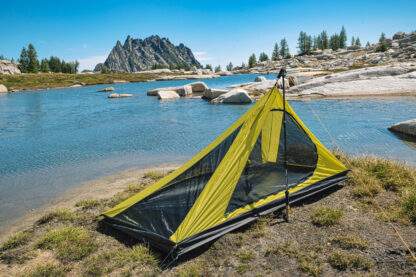 backpacking trekking pole tent set up near water